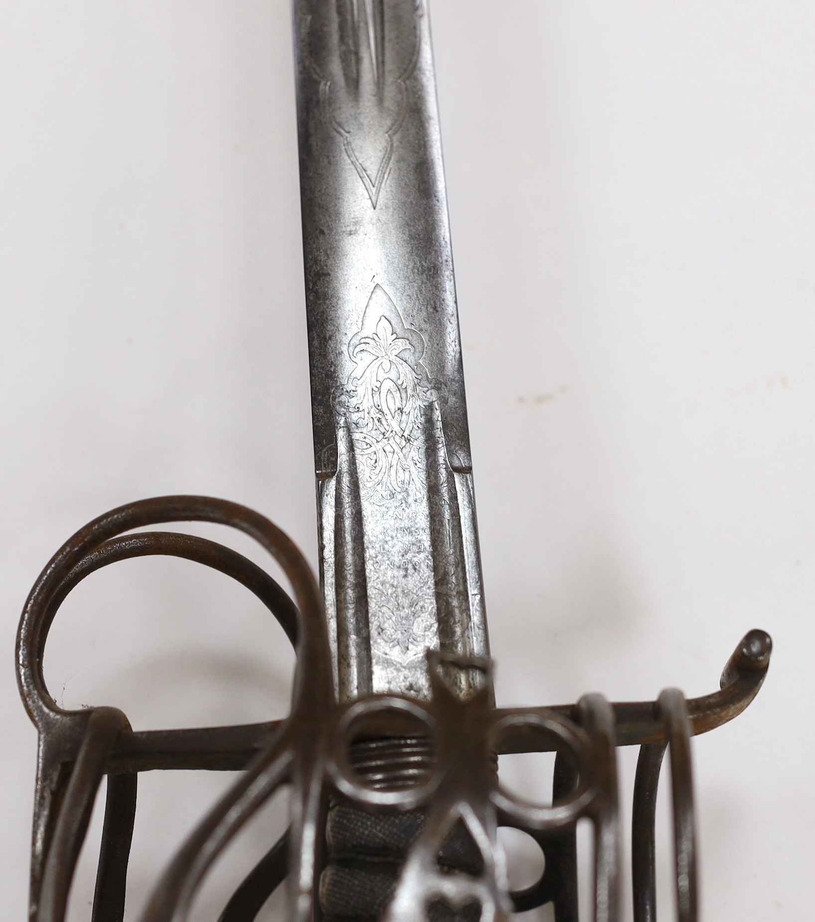 An early 19th century regulation Scottish infantry officer's Wilkinson’s broadsword of the 74th Regiment, with steel basket and pommel, double fullered blade engraved with VR cypher and the motto ‘Nemo me impune lacessit